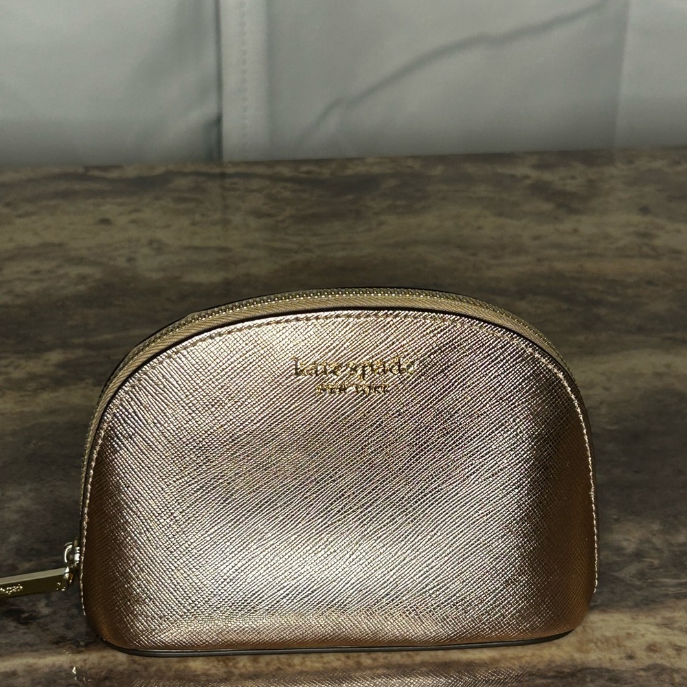 SOLD Kate Spade Gold Women's makeup pouch